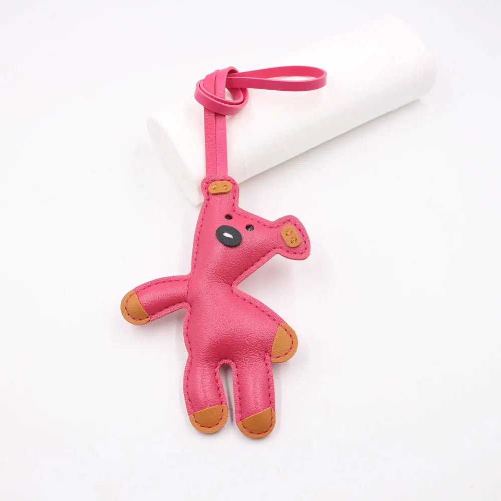 LE PETIT OURS ROSE BONBON -