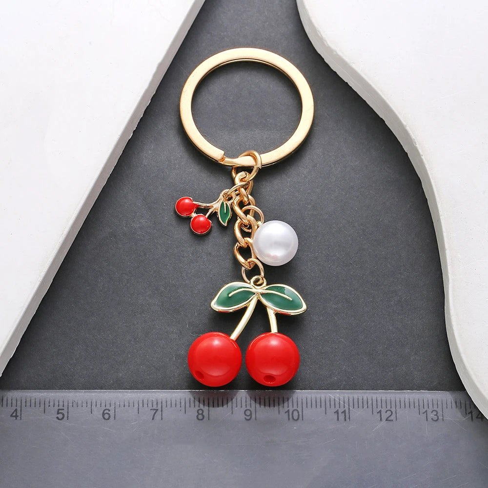 Porte - clé Bijou <br> Les Cerises jumelles - Doré