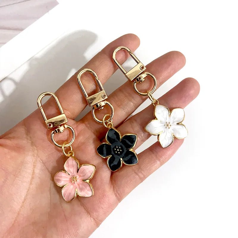 Porte - clés Bijou <br> La Fleur de lotus dorée - Noir et doré