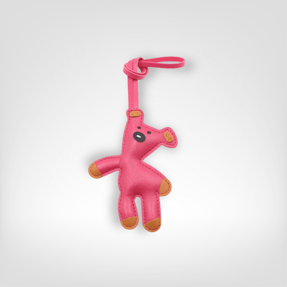 LE PETIT OURS ROSE BONBON - 