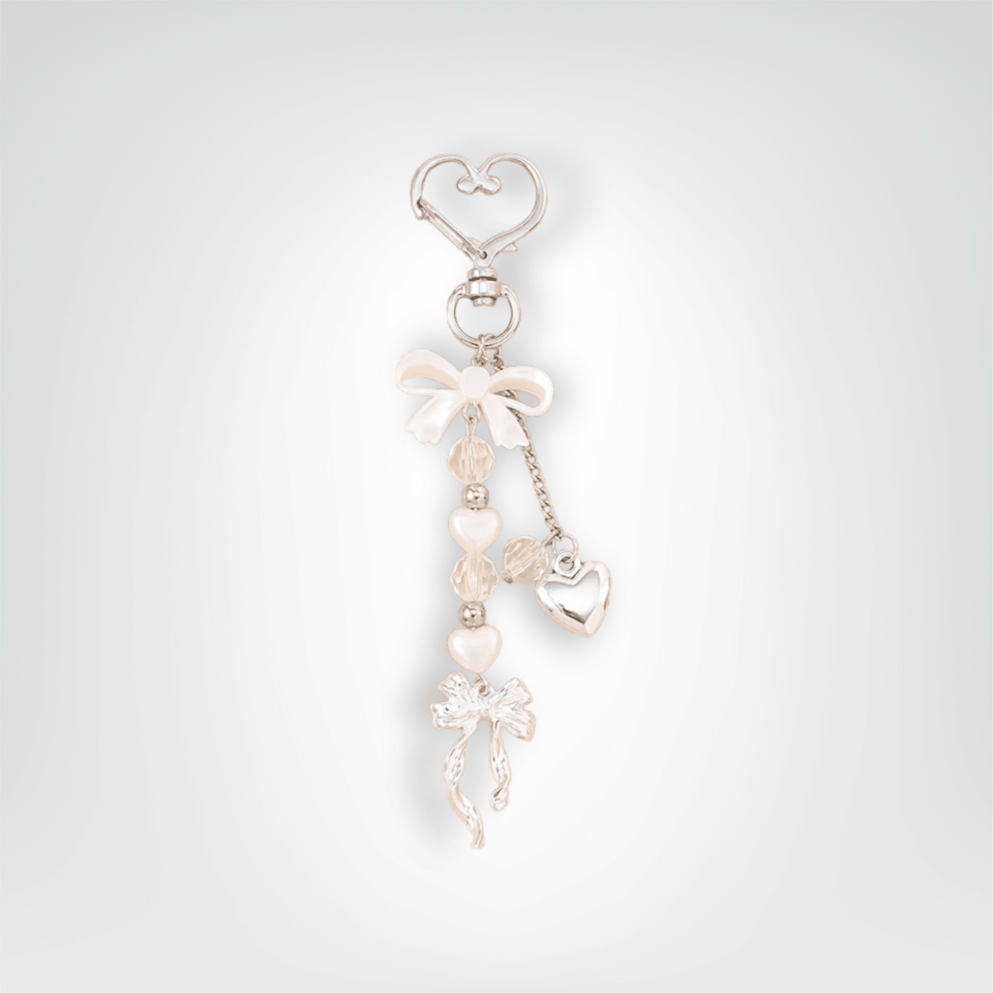 Porte - clé Perle <br> Le cœur argenté - Blanc et argent