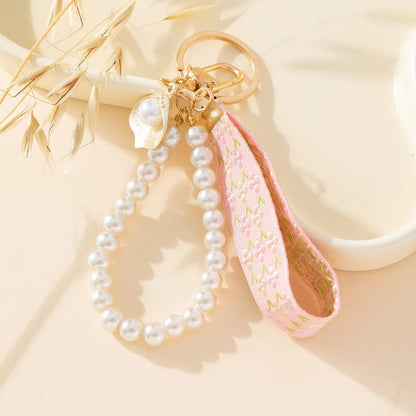 Porte - clé Perle <br> Le Ruban rose - Rose