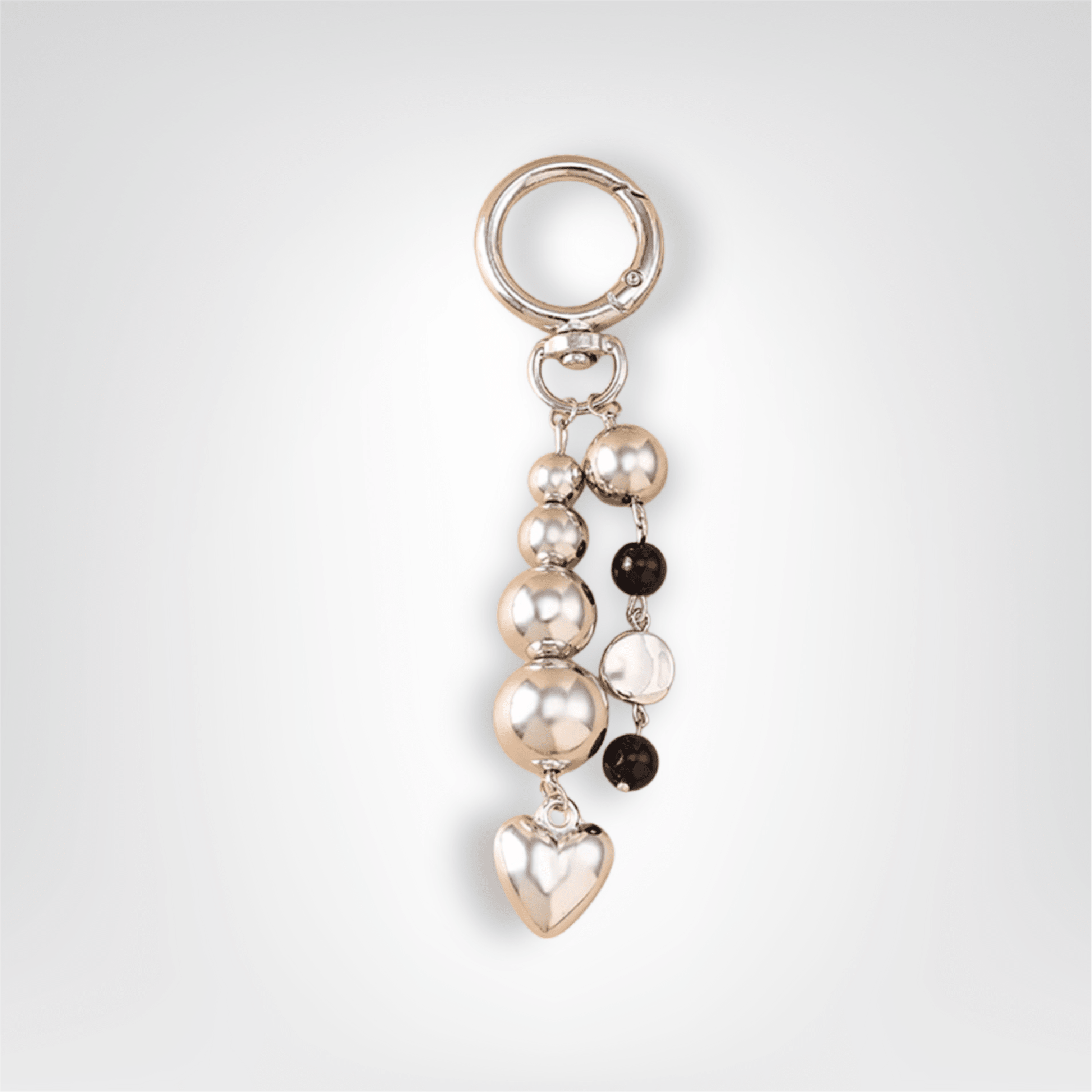 Porte - clé Perle <br> L’Harmonie argentée - Noir et argent