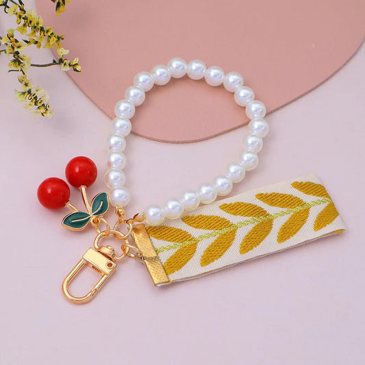 Porte - clés Perle <br> Le Ruban cerise - Caramel